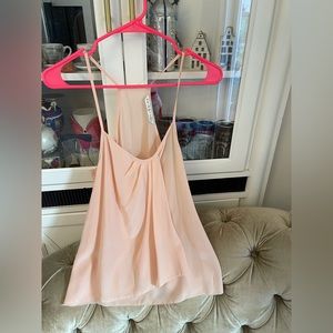 Trina Turk baby pink top, size small. Few small spots that you can barely see.